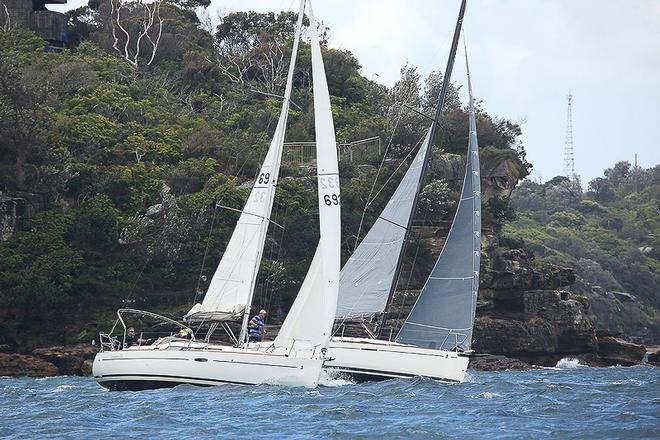 Flying Circus, skippered by Craig Boulton, was the winner of Div 2 Non-Spinnaker, with a first and second place on the day. Also seem here is 1st and Menage a Trois, skippered by Karl Matiszik, after they have rounded the mark at Chowder Bay and are on their way to Shark Island - 2017 Beneteau Cup ©  Alex McKinnon Photography http://www.alexmckinnonphotography.com
